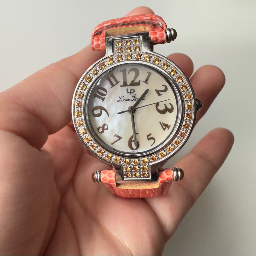 Lucien Piccard Woman’s Orange Sapphire Bezel Watch